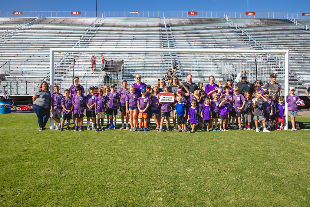 large group of youth soccer players and their coaches